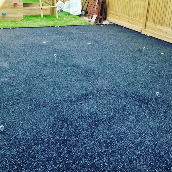 Wet Pour Rubber Safety Surface Installed Under A Play Area GCL