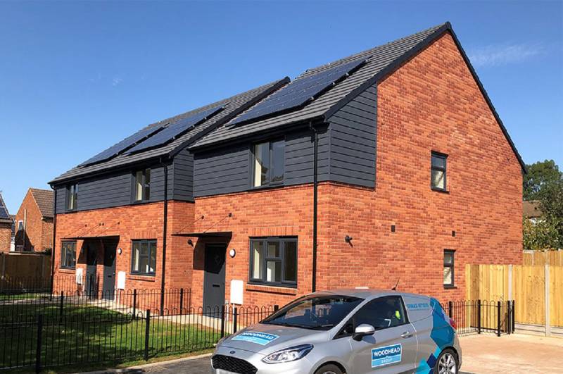 Social Housing Leicester Russell Roof Tiles NBS Source