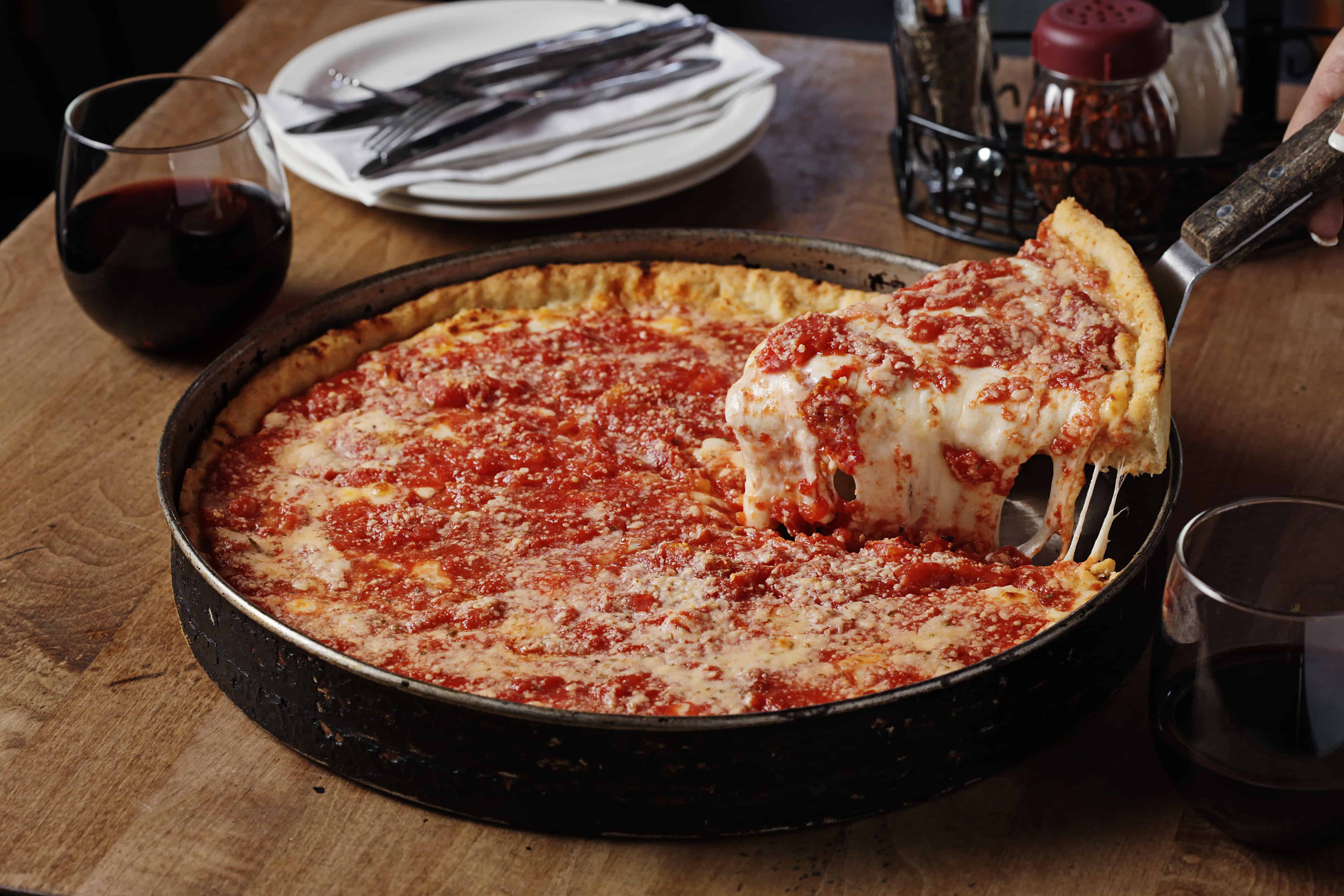 54 Chicago Style Pizza Chain Informally Daily Crossword Clue