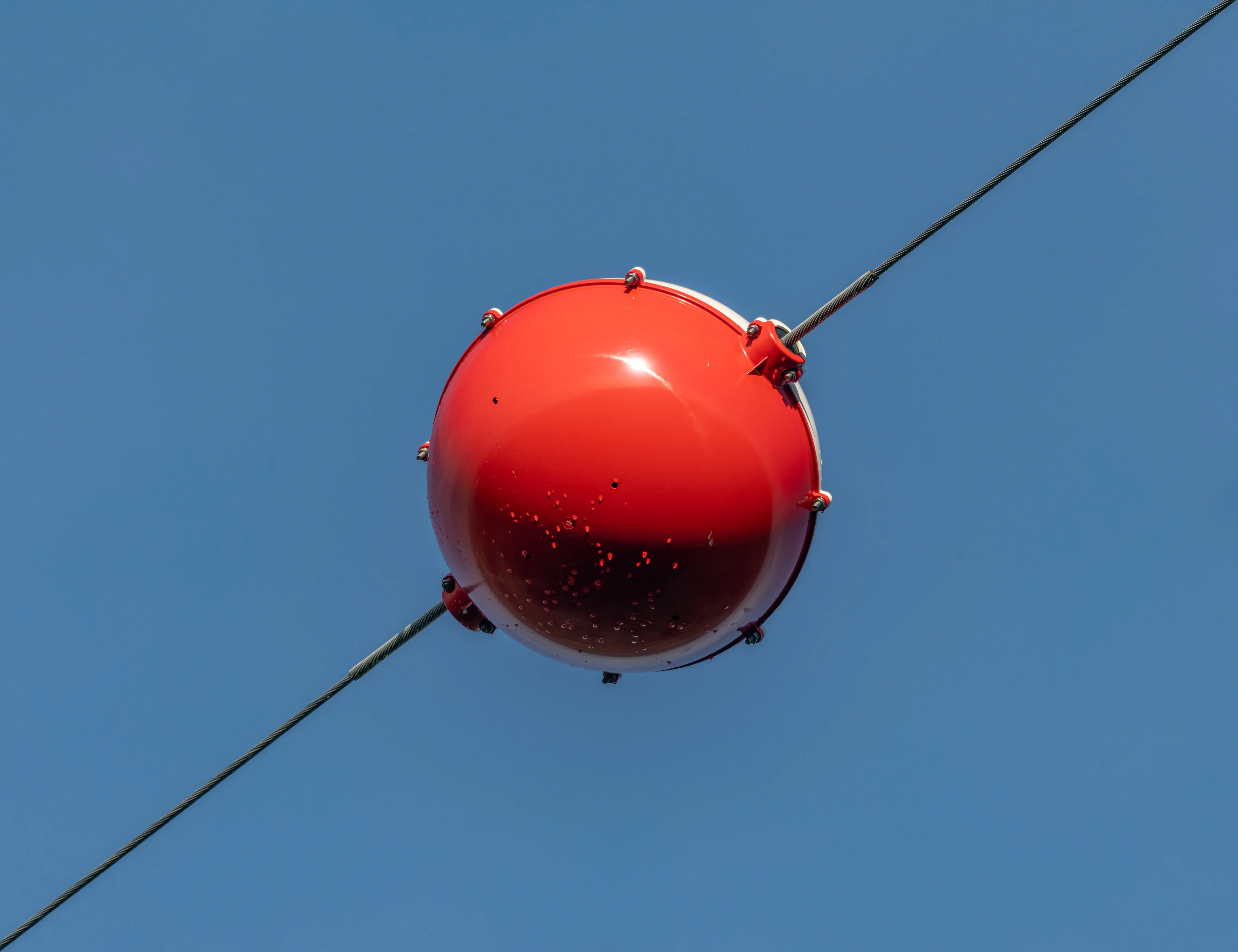 What Are Those Big Colorful Balls You See On Powerlines? | IFLScience