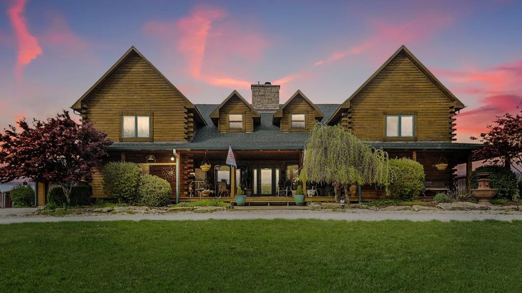 Stunning Log Home Retreat on 34 acres borders 1420 acre conservation area