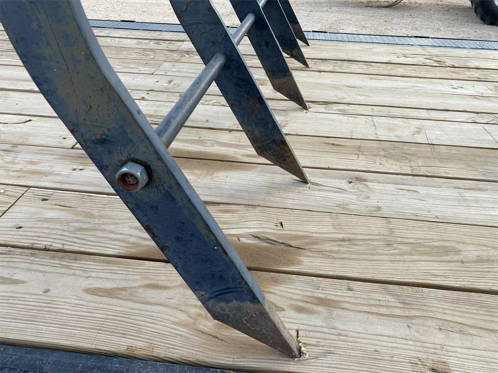 Buhler Allied Grapple Loader and Skid Steer Attachment Call