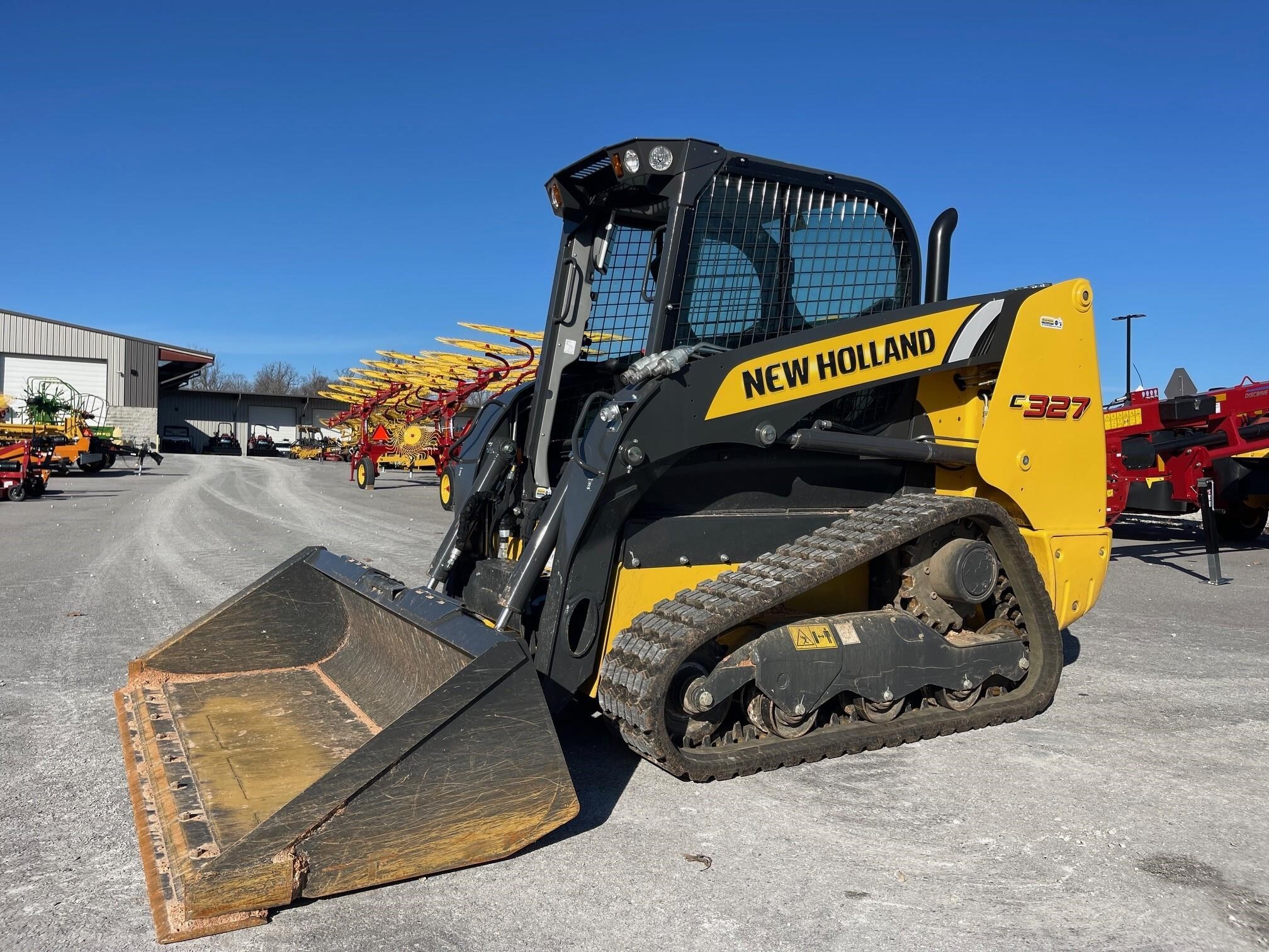2023 New Holland C327 Skid Steer 54,900 Machinery Pete