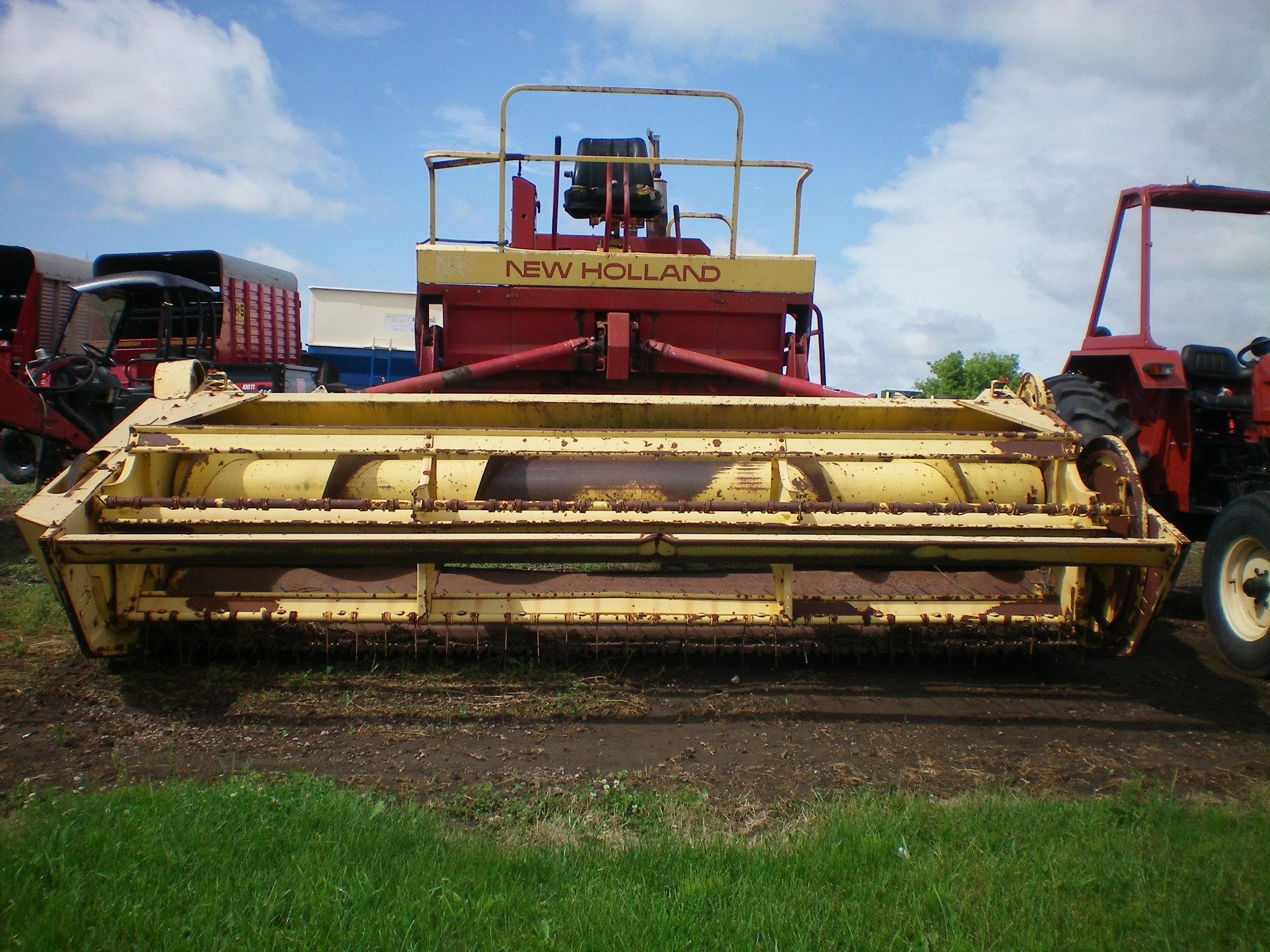 New Holland 1100 SelfPropelled Windrowers and Swather 5,995