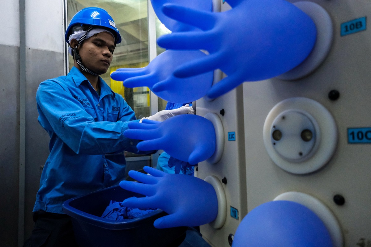 Glove maker stocks cement dominance in Malaysia as virus spikes KLSE