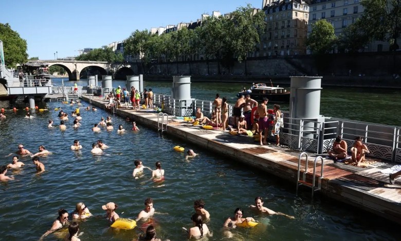 Swimmers return to the Seine under Olympic rule Swimmers return to the Seine under Olympic rule
