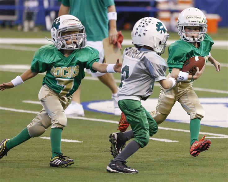 Rookie Tackle youth football players show their stuff at halftime of