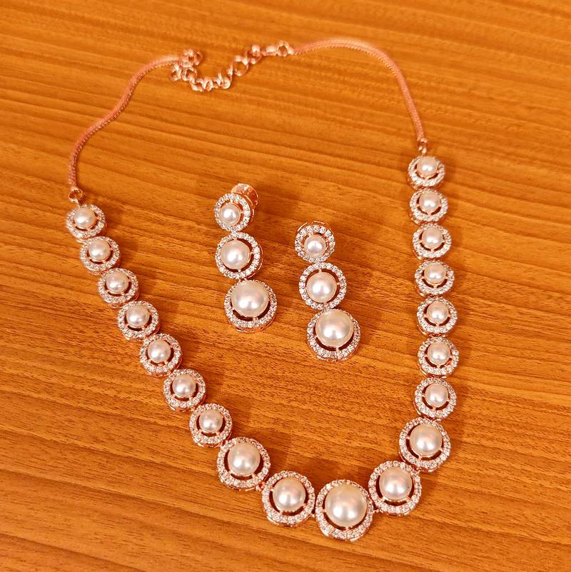 White pearl necklacesets Sanvi Jewels Pvt. Ltd. 3945027