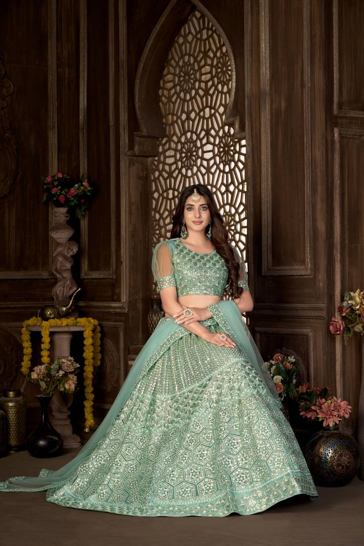 Green embroidered net semi stitched lehenga Varni Fabrics 3946574