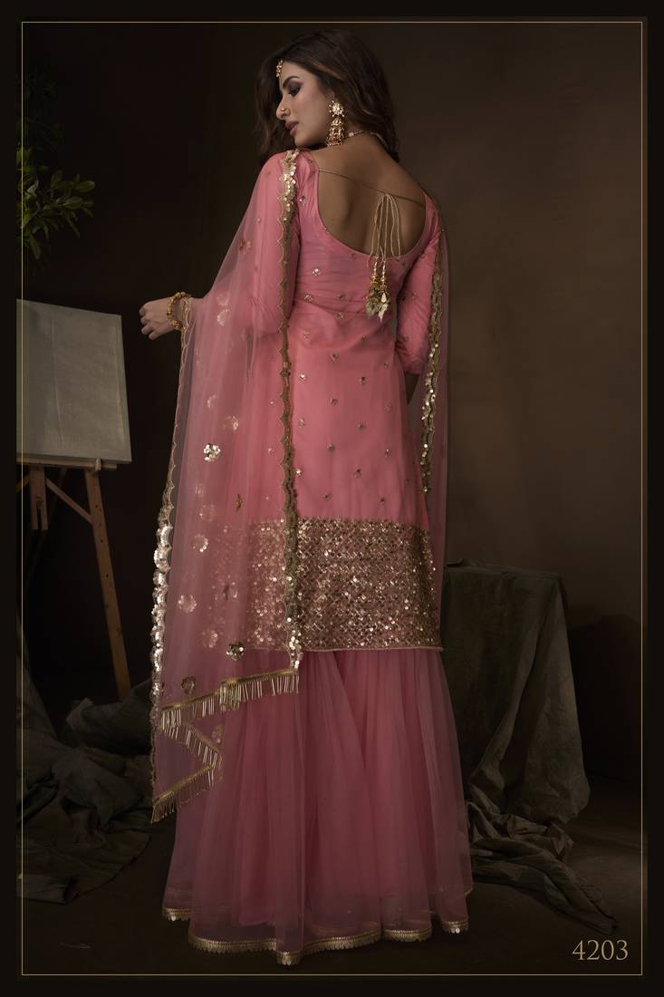 Fetching Pink sequins embroidered net fabric sharara Kameez Designs