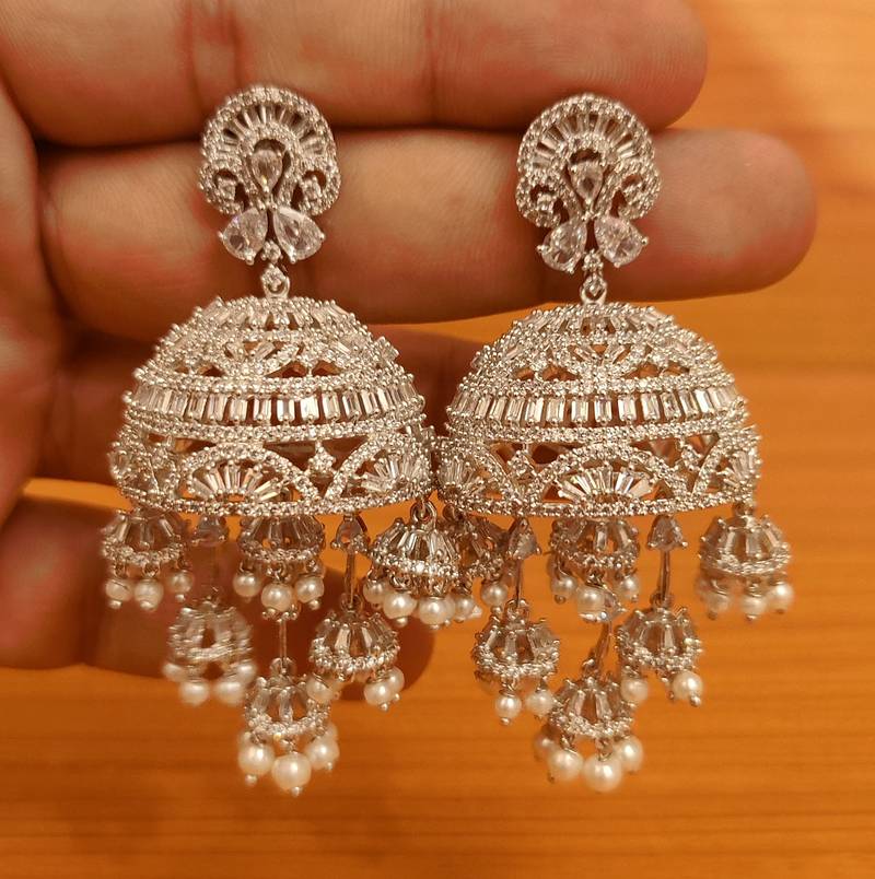 White jhumkas Sanvi Jewels Pvt. Ltd. 3610999