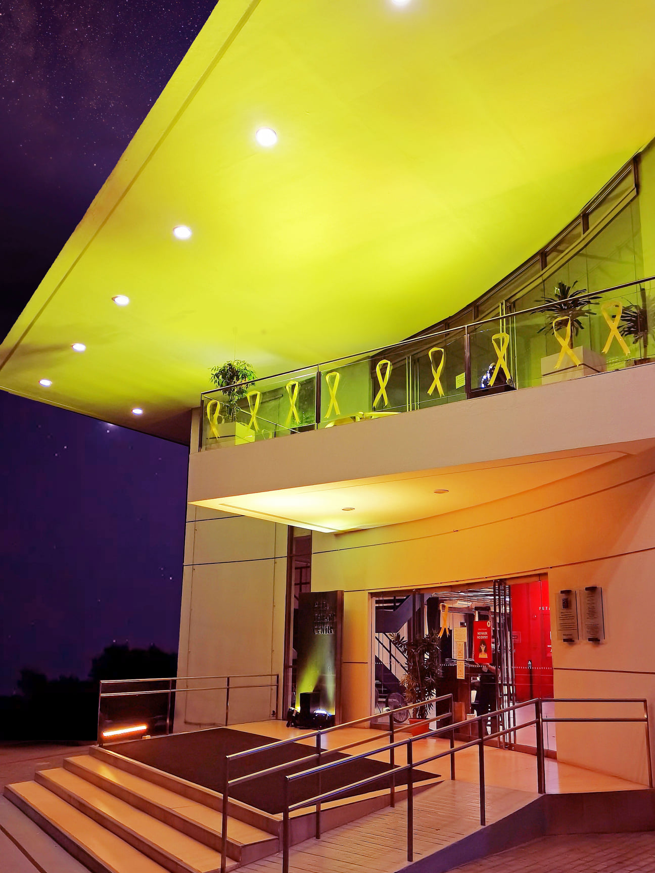 Yellow lighting, ribbons display across Philippines in honour of Aquino Asia Pacific Report