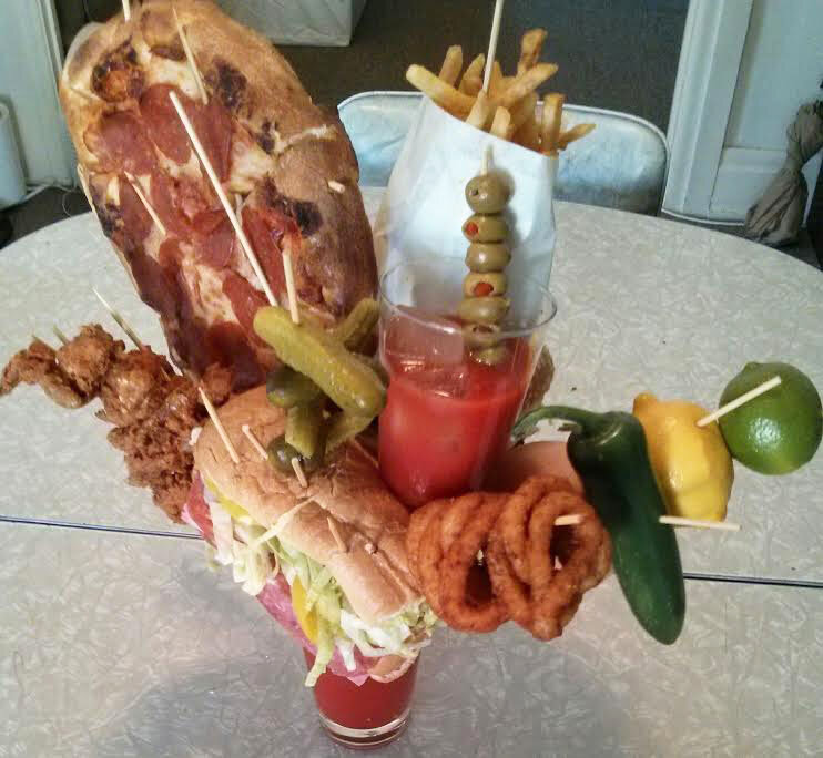 Comedian Randy Liedtke creates a Bloody Mary with whole pizza, footlong