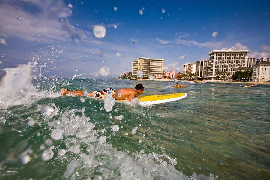 Best Beaches in Hawaii to Learn How to Surf, According to Pro Surfers
