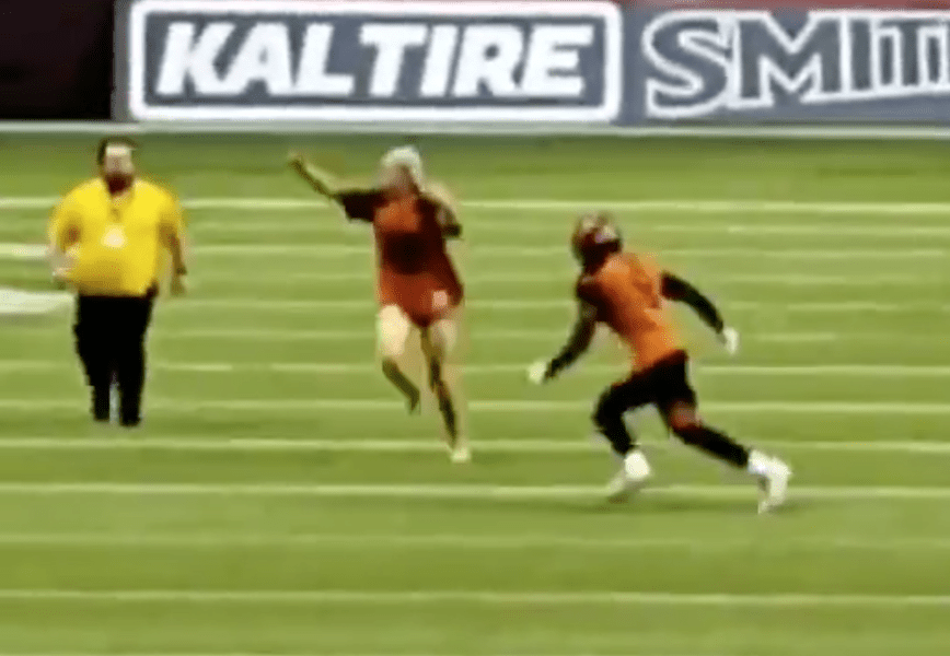 Fan Tackled by CFL Player for Streaking on Field During BC Lions Game
