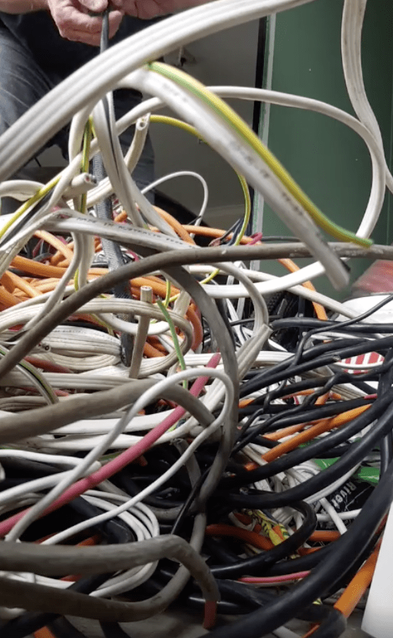 Snake Hides In Pile Of Electrical Wires - The Dodo
