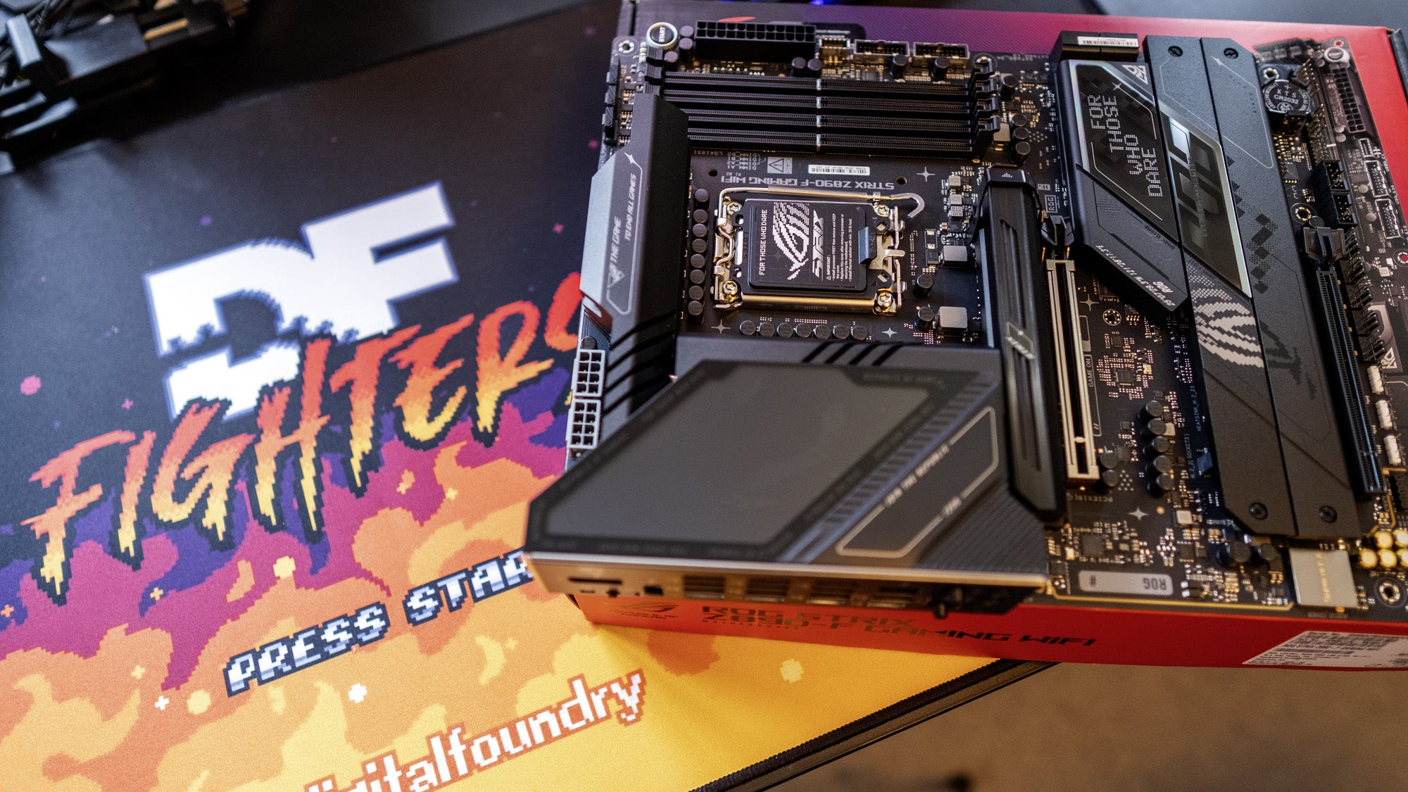 an asus rog strix z890-f gaming wifi motherboard showing its top