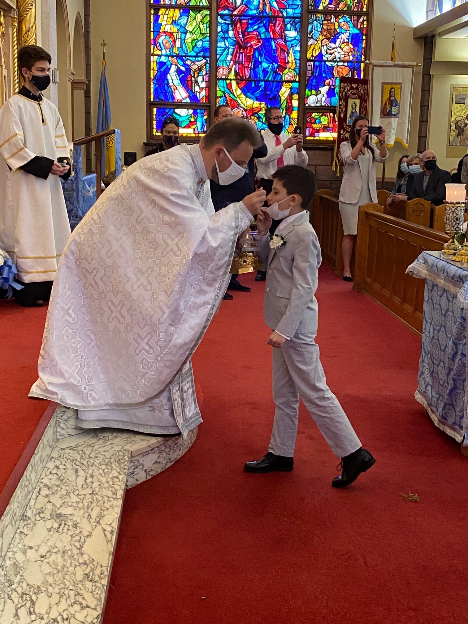 Celebrating First Solemn Holy Eucharist Assumption Catholic School