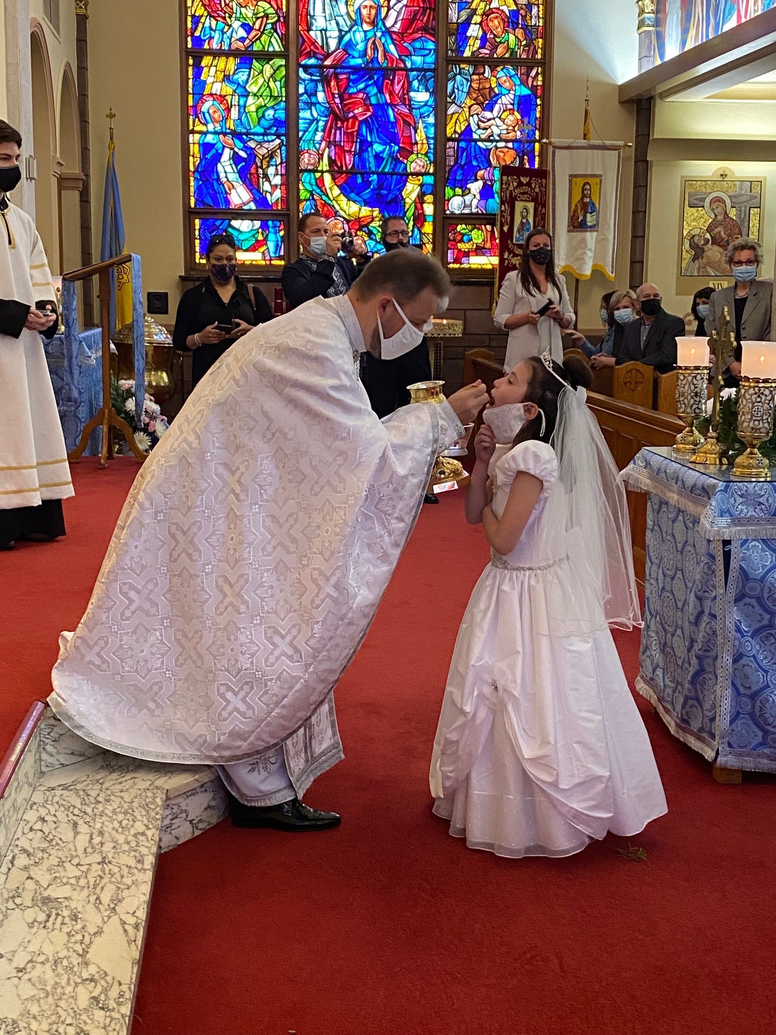 Celebrating First Solemn Holy Eucharist Assumption Catholic School
