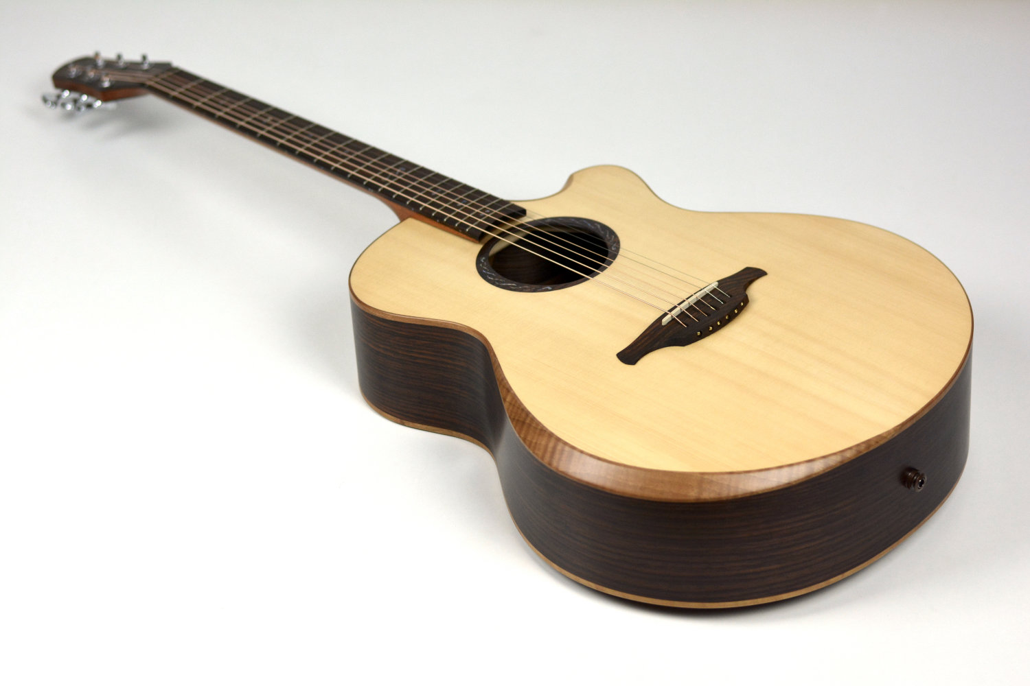 Astha Guitars of Hope Fine guitars handcrafted in India