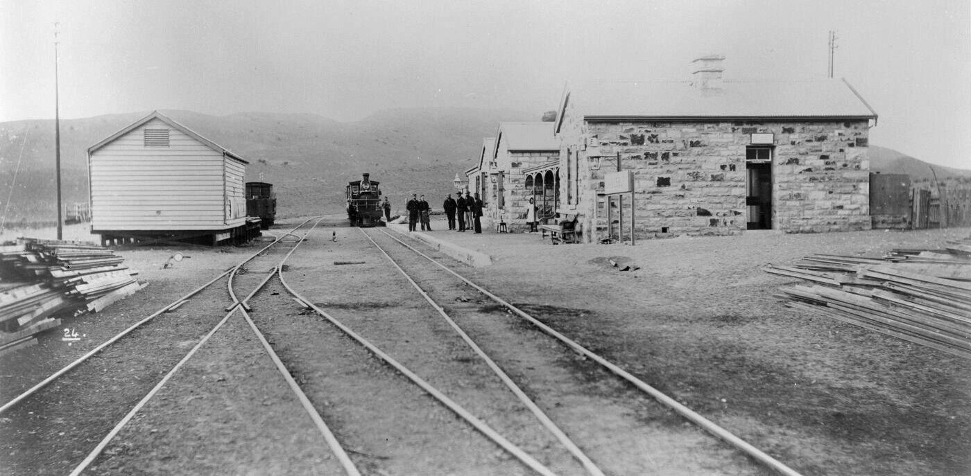 Laingsburg, 1895. Station buildings with steam and station
