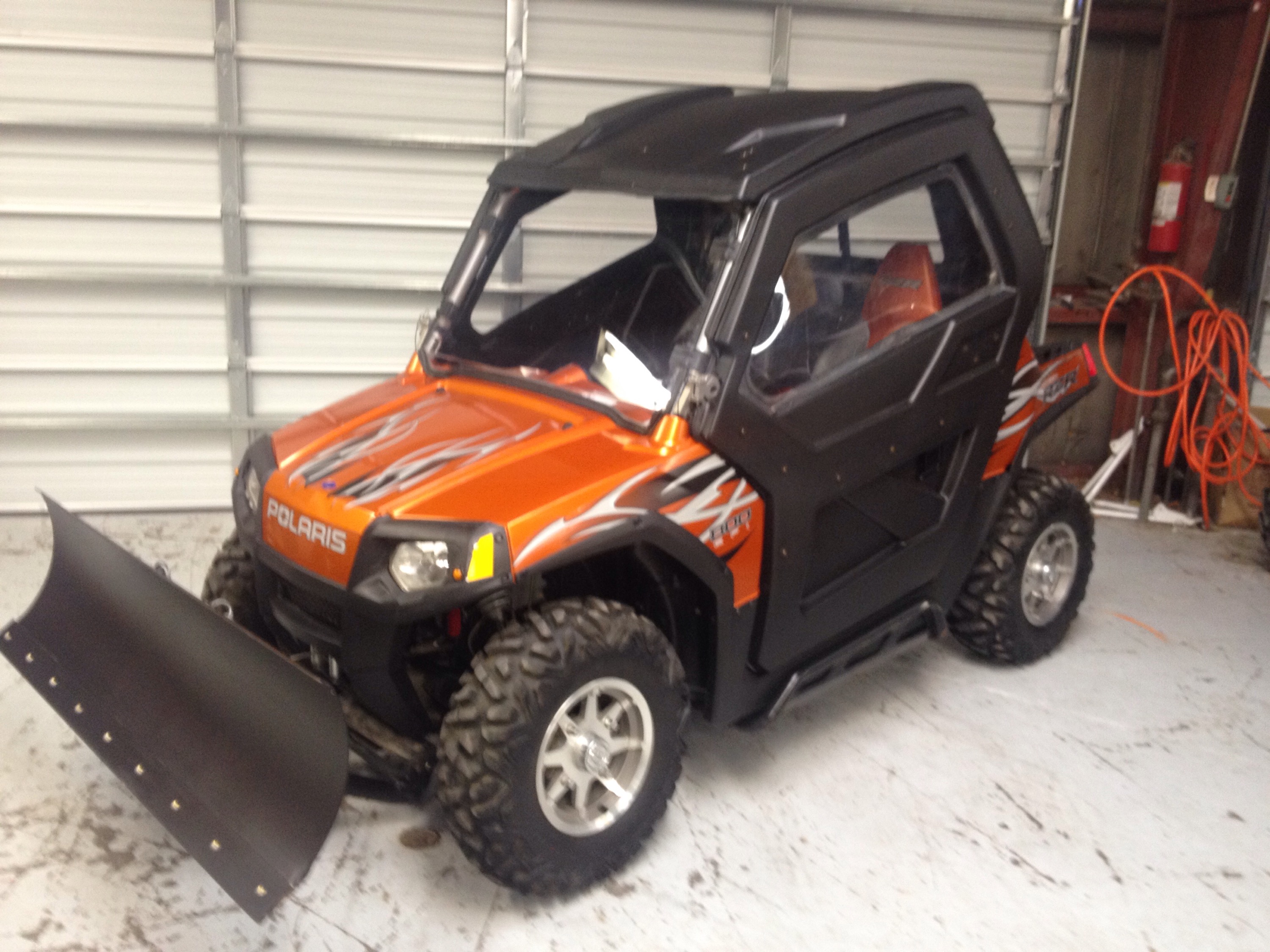 SOLD. 2009 Polaris RZR 800 50" 2100 miles, winch, plow, full cab