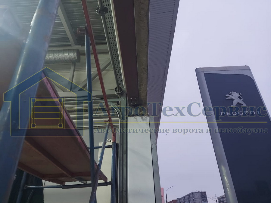Ремонт секционных ворот в автосалоне Peugeot г. Тула АгроТехСервис