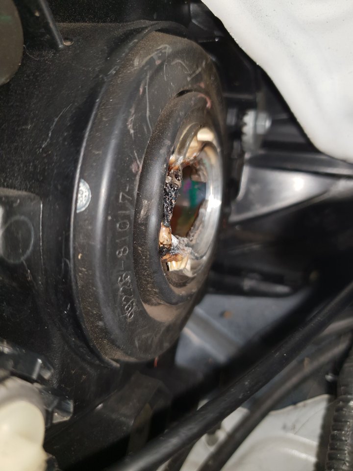 Headlight assembly melted? Do I need to replace it altogether. Pics
