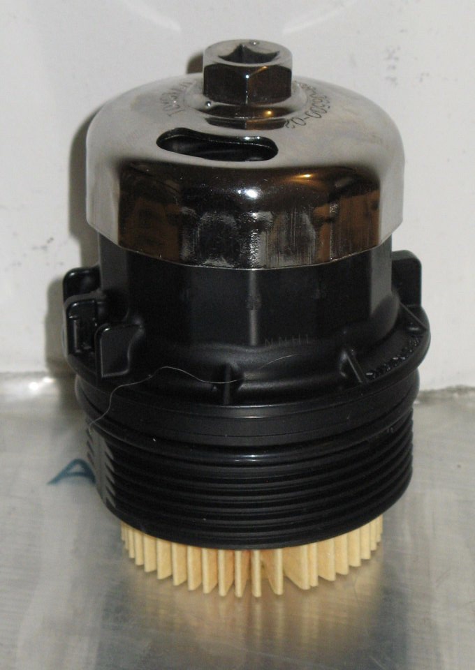 The overtight oil filter catridge cap......It's not the dealer's fault. PriusChat