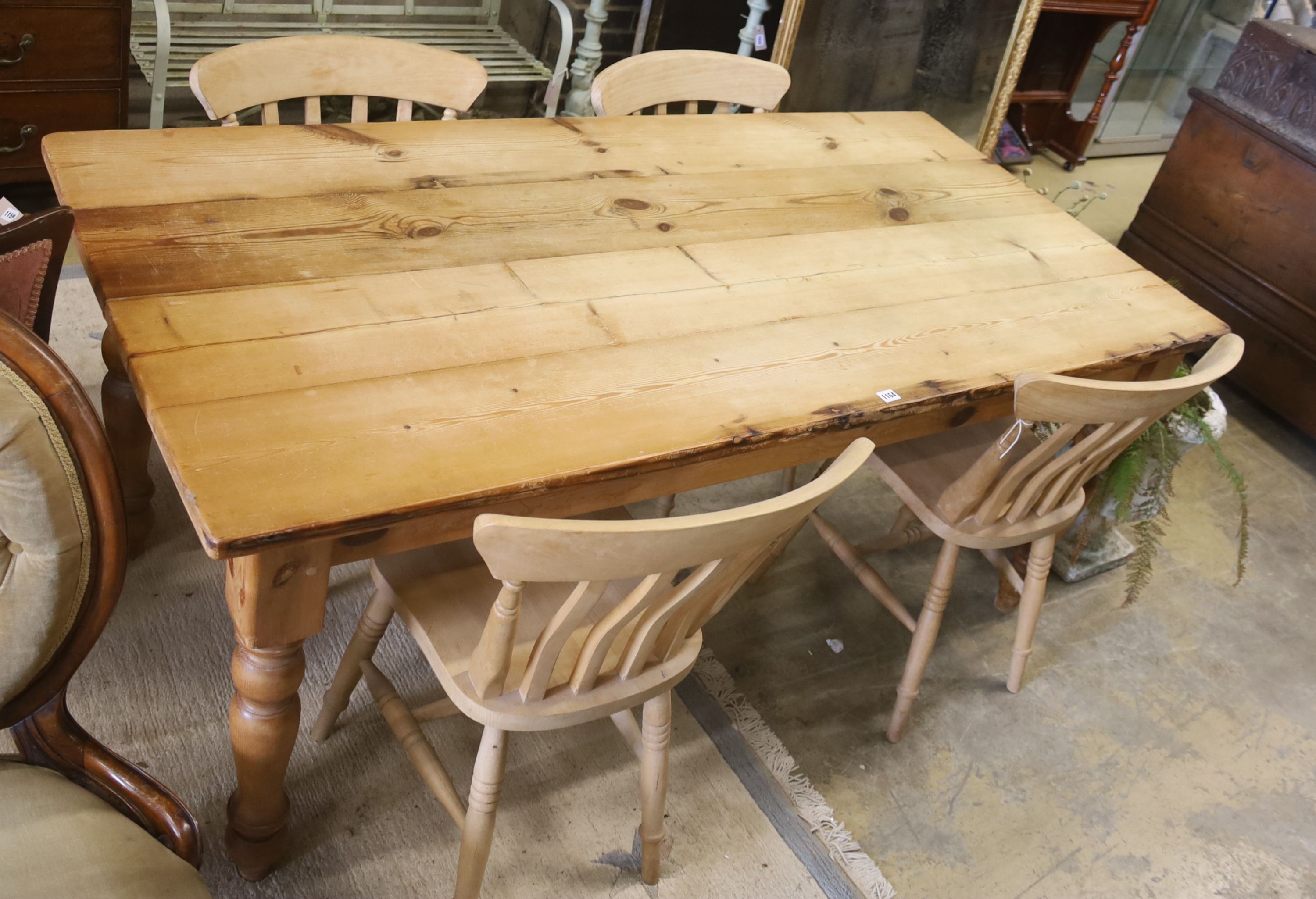 A pine 'farmhouse' kitchen table, length 183cm, depth 87cm, height 78cm
