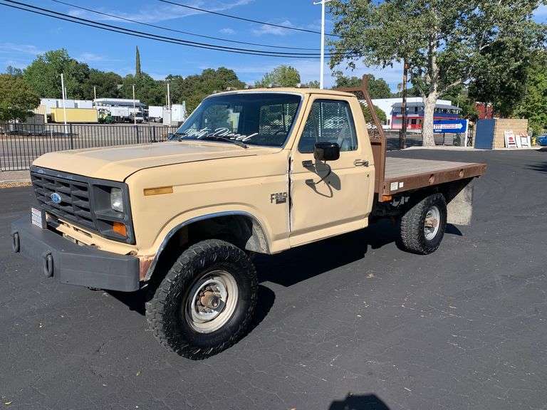 1986 F 250 4x4 Diesel Flatbed 777 Auction Company