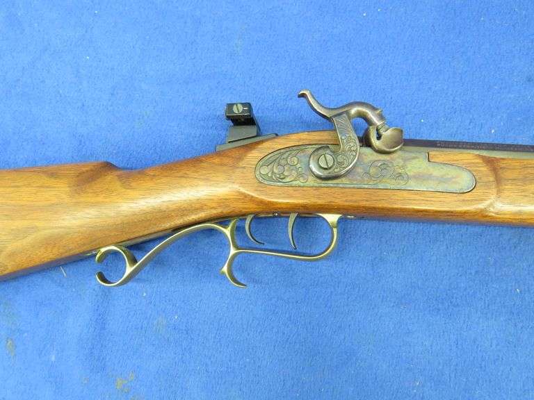 Thompson Center Arms 50 caliber Hawken black powder rifle. Williams