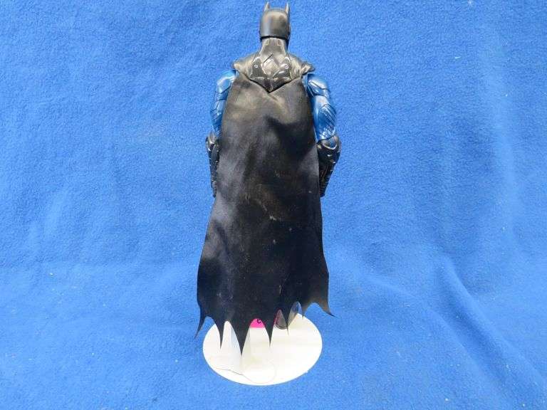 12" tall Batman action figure with a stand. AAA Auction and Realty