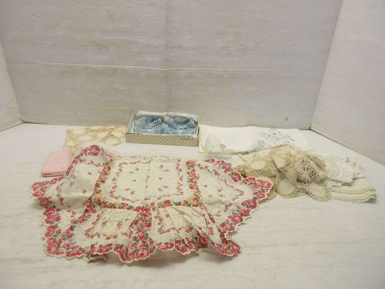 (12) Mostly handmade doily, includes One matching set of doilies, two