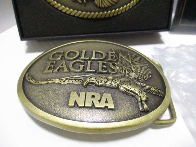 (2) NRA Golden Eagle belt buckle and assorted NRA pins Albrecht
