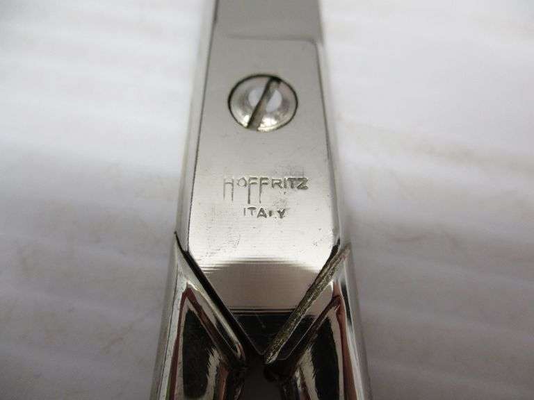 Pair of Hoffritz made in Italy chrome stainless scissors with original