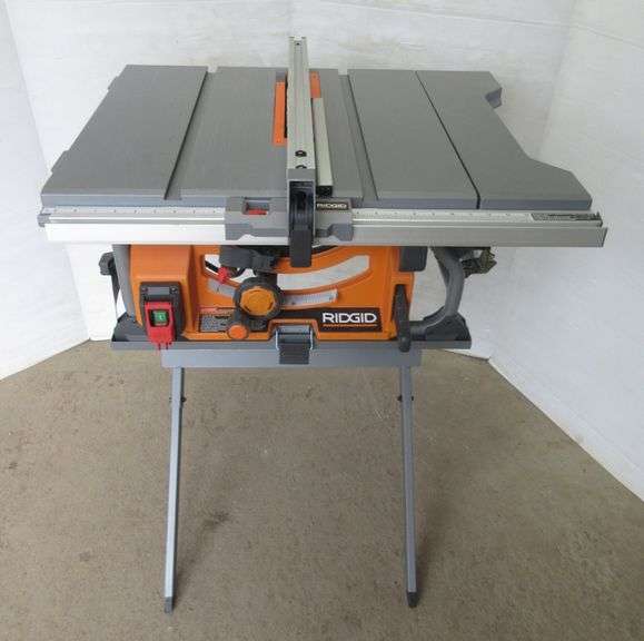 Ridgid 10" table saw with folding stand, great Albrecht Auction Service