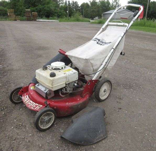 Snapper push mower, includes original bagger that was never used, 18