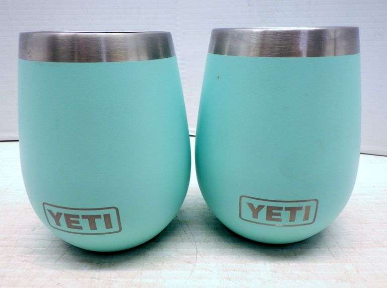 (2) Yeti wine glasses, 3 1/2"W x 4 1/2"H Albrecht Auction Service
