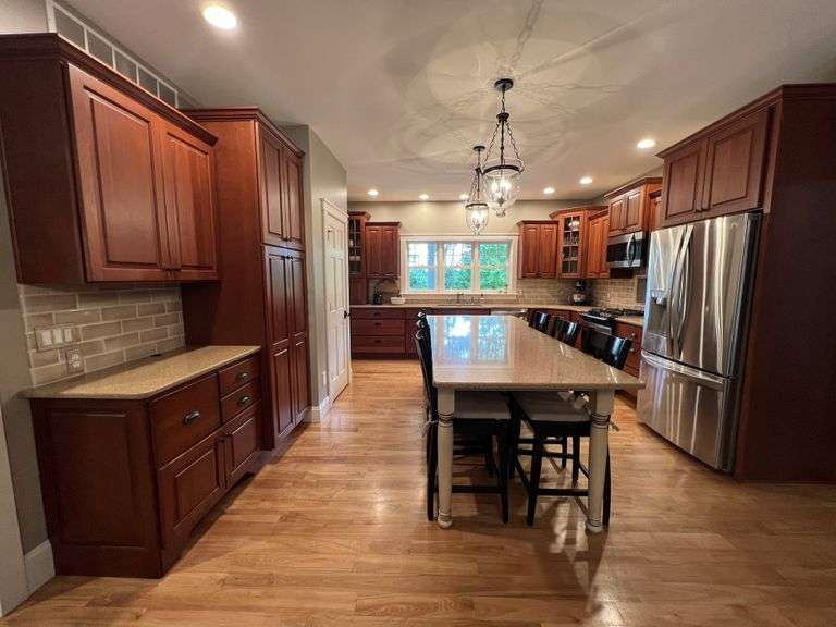 2006 Pioneer cherry kitchen with Cambria quartz countertops