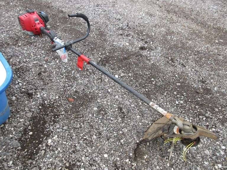 Troy Bilt weed whacker with jumpstart drill attachment, tested June