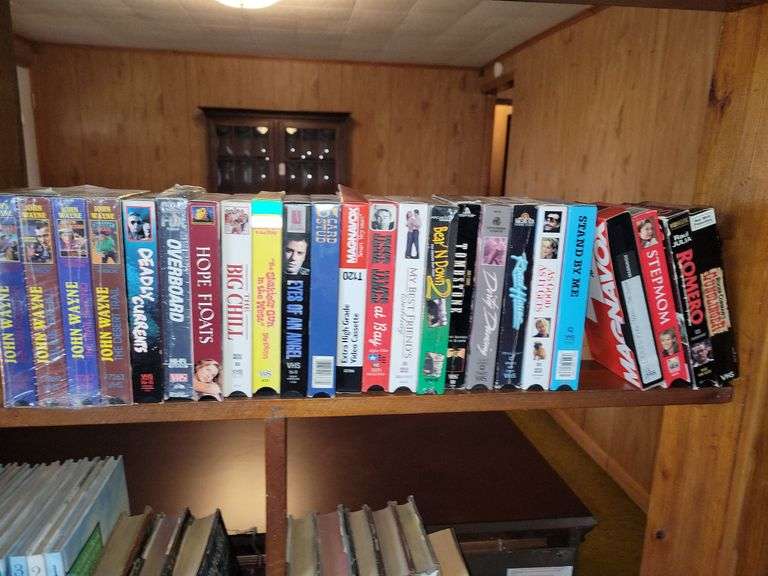 Assorted Books and VHS Tape Movies Baer Auctioneers Realty, LLC