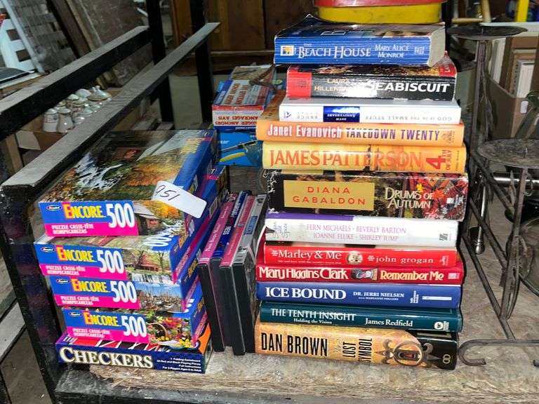 Assorted Books, Puzzles Baer Auctioneers Realty, LLC