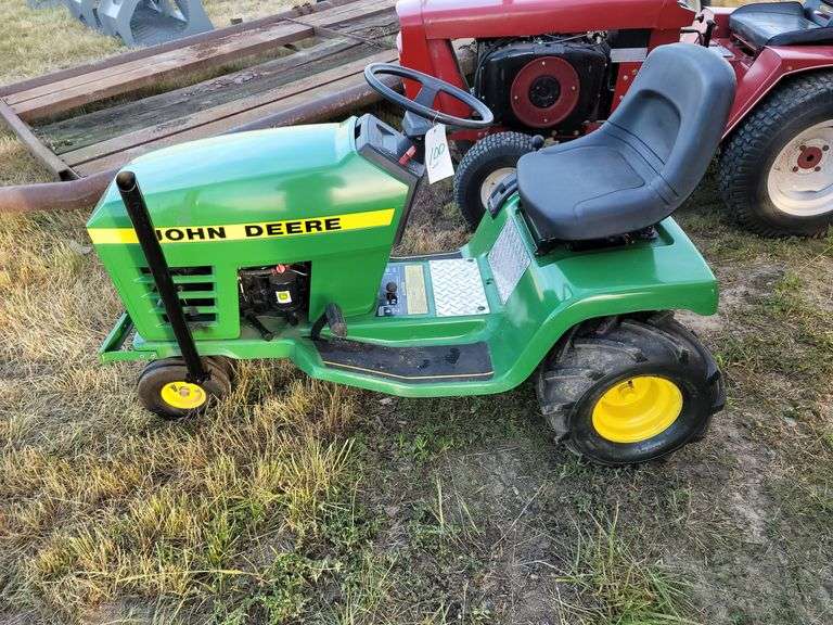 John Deere Pulling Mower Baker Auctions & Real Estate, LLC