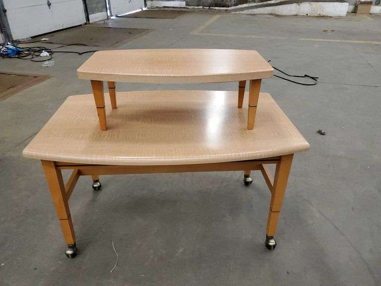 Formica top display table on casters (42w x 28d x 23h) with stacking