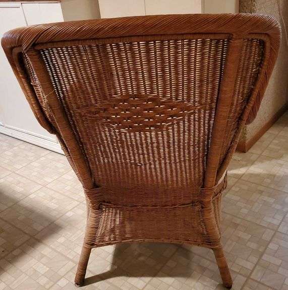 Pier 1 wicker chair with cushion seat measures 24L. Basement Bid
