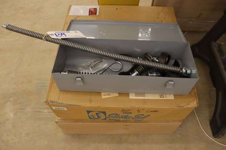 RotoRooter bits in tool box with 2 Electric Eel Model R Flex Leader