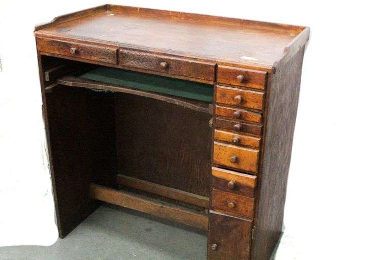Jeweler's Desk or Watchmakers Work Bench with railing and multiple wood drawers in differing