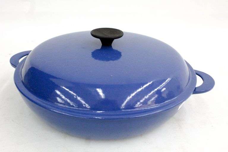 Le Creuset enameled cast iron braising pot with matching lid, 12
