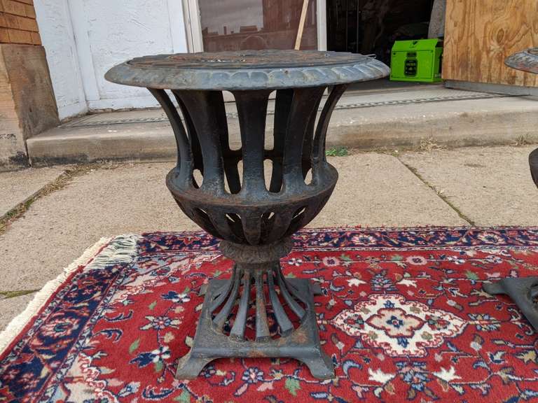 PAIR OF CAST IRON PLANTERS Bid On Estates